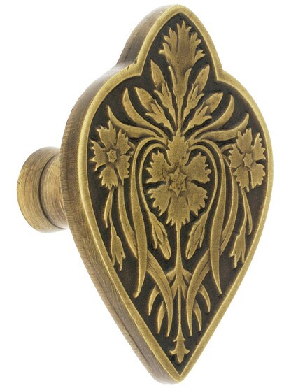 1 1/2 inch W X 1 7/8 inch H Dianthus Knobs in Antique Brass.